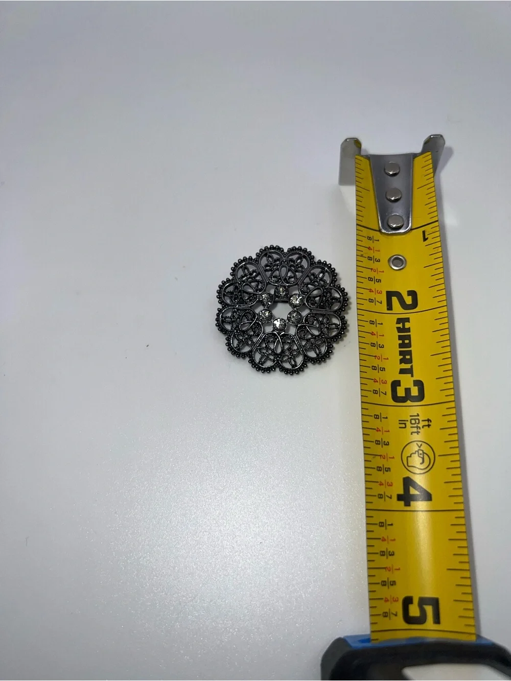Black Filigree Round Brooch with Crystal Accents